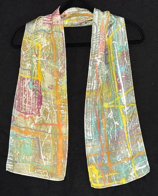Silk scarf in olive with multi color abstract paterns