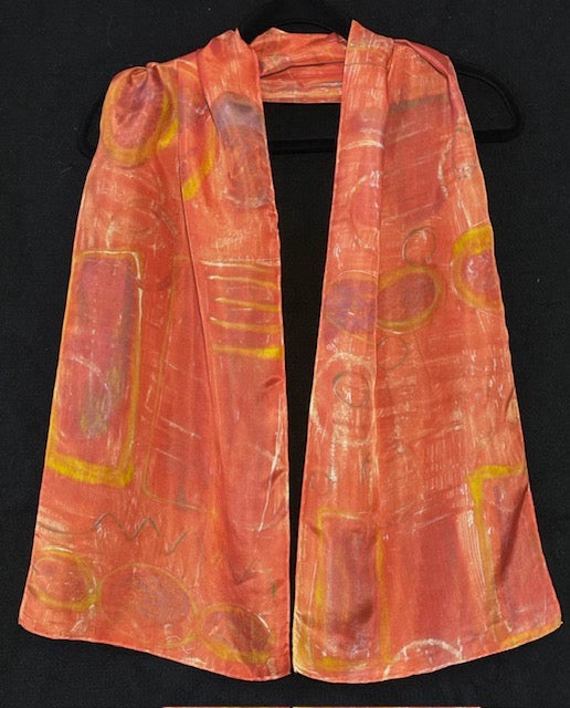 Silk scarf hand printed in brick orange with gold and plum accents